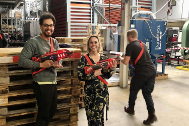 SILICON playing laser tag at a teambuilding event