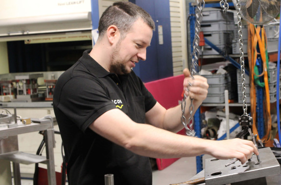 SILICON Tooling employee checking tool